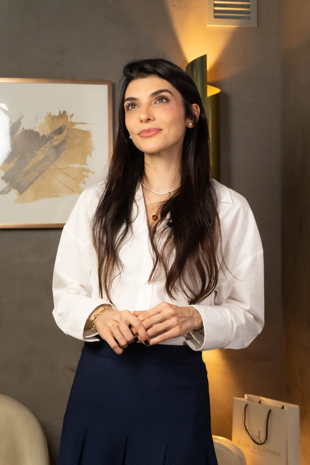 Lounge da clínica Júlia Saldanha Dermatologia — atendimento personalizado em Porto Alegre.